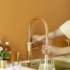 Quooker Fusion Round Goud met PRO3 en een CUBE in een derde keukenopstelling